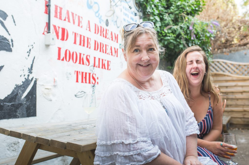 Photo of Kate and Ali Guindi who started Pottery & Pints